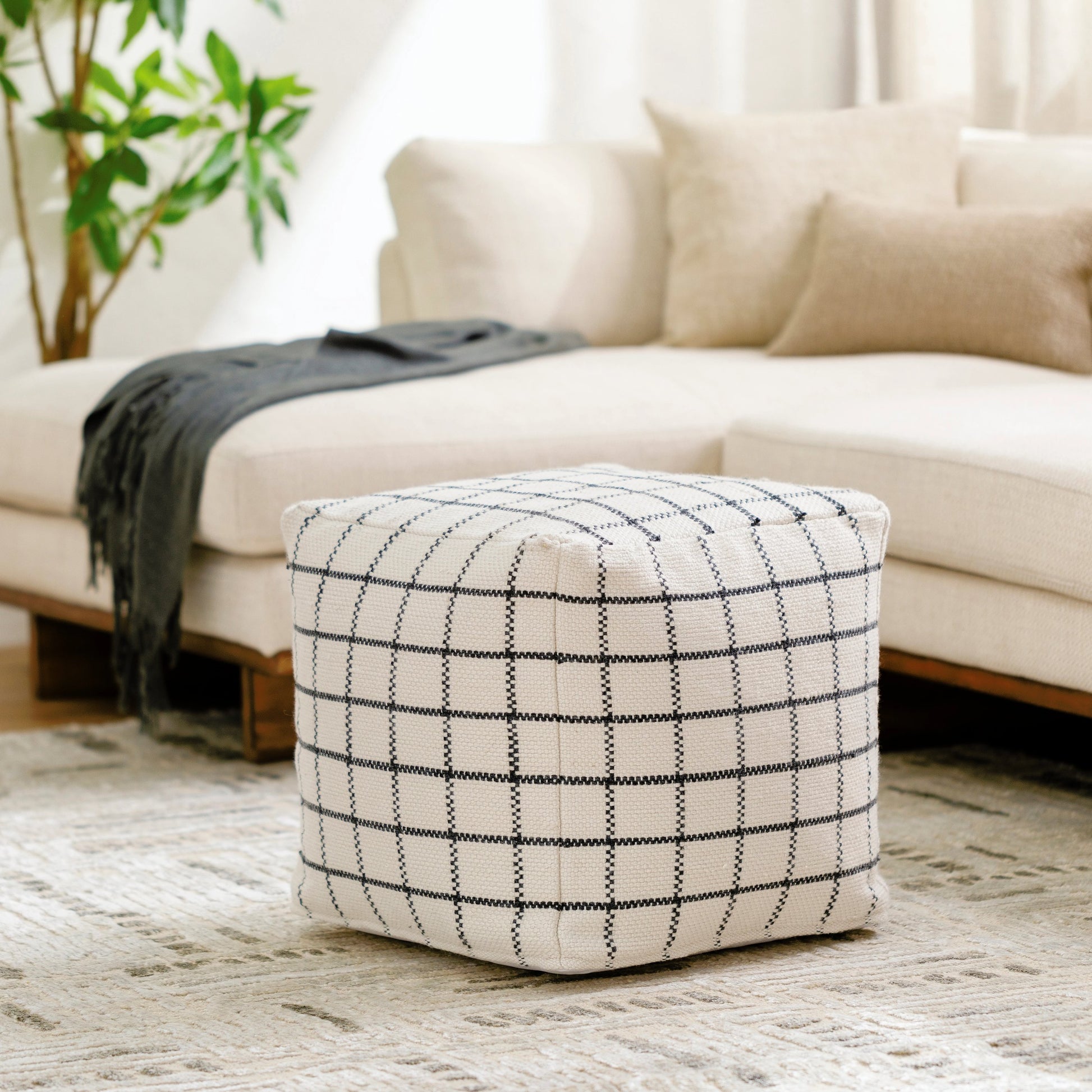 Charmaine Indoor/Outdoor Pouf by Surya in off-white, light silver, light grey, sterling grey. Made from top: 100% recycled pet yarn, bottom: 100% polyester, fill: 100% polybeads in a modern style.