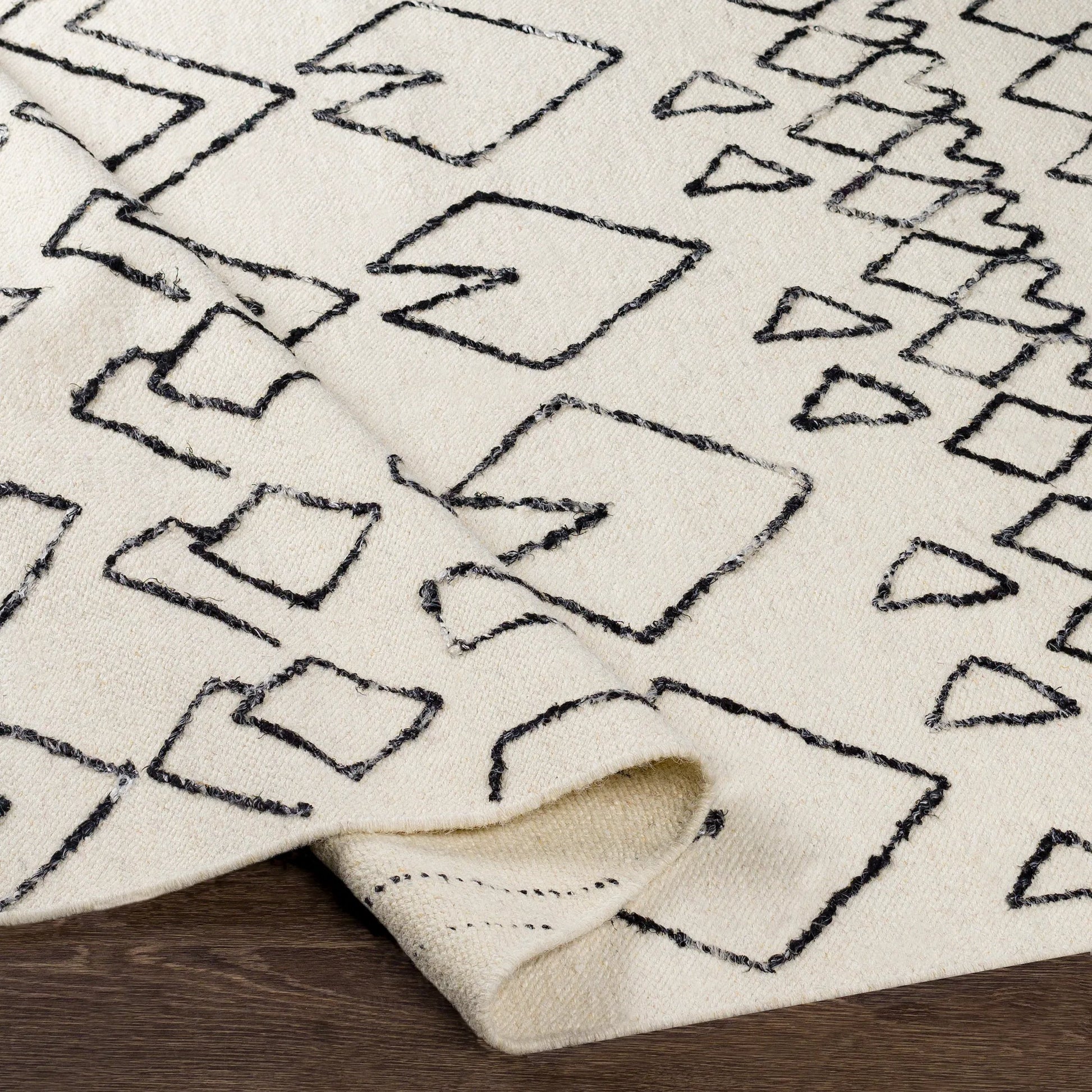 Nettie Rug - 16386 by Surya in cream, black. Made from 70% wool, 30% cotton in a unique style.