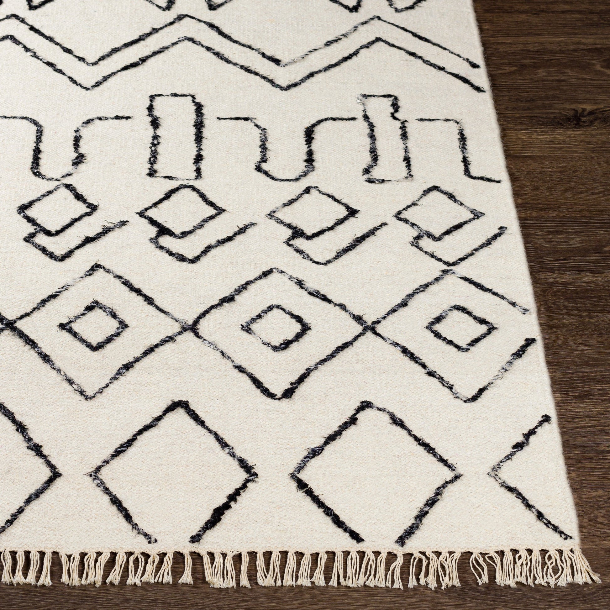 Nettie Rug - 16386 by Surya in cream, black. Made from 70% wool, 30% cotton in a unique style.