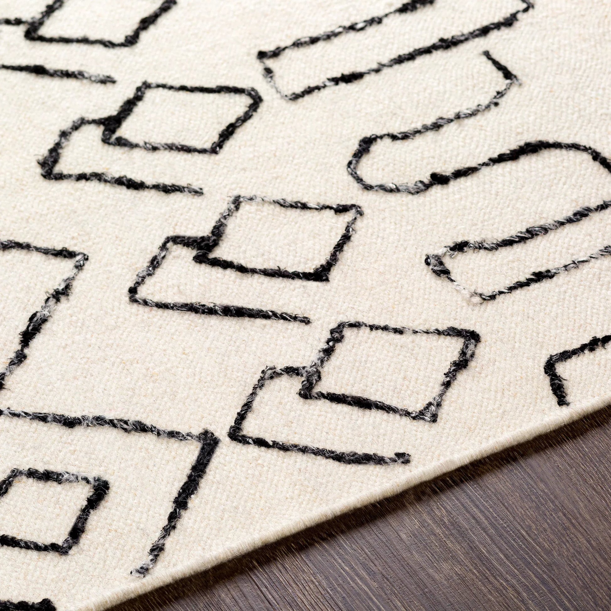Nettie Rug - 16386 by Surya in cream, black. Made from 70% wool, 30% cotton in a unique style.
