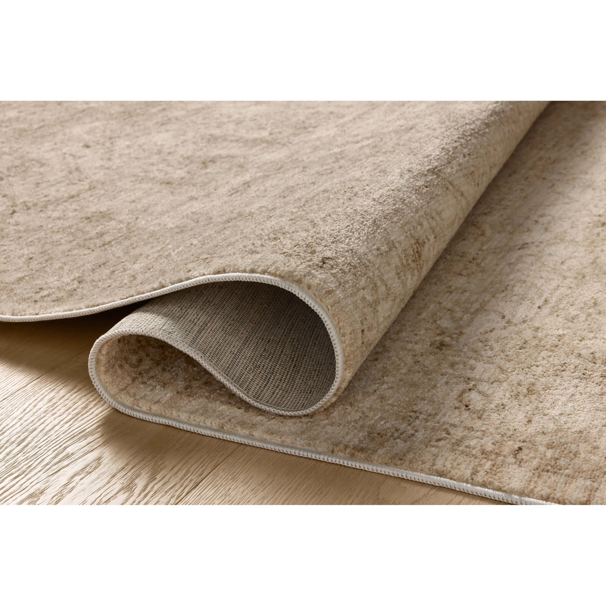 Newman NEW-01 Rug by Loloi. Made from 100% space dyed polyester in a unique style.