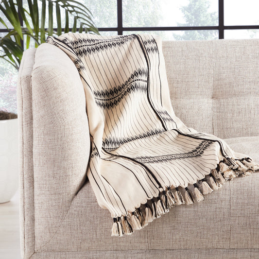Saramati Nagaland Throw by Jaipur Living in cream, black. Made from 100% cotton in a eclectic & global style.
