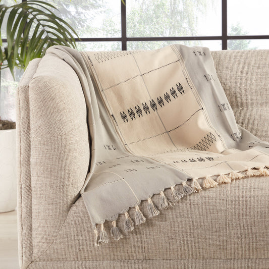 Sekrenyi Nagaland Throw by Jaipur Living in cream, gray. Made from 100% cotton in a eclectic & global style.