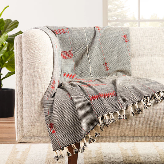 Nagaland Throw NGD07 Throw by Jaipur Living in black, red. Made from 100% cotton in a transitional style.