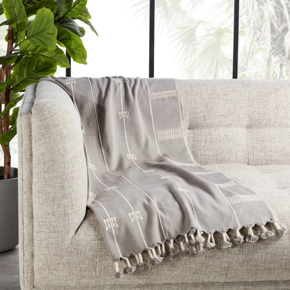 Nagaland Throw NGD10 Throw by Jaipur Living in light gray, cream. Made from 100% cotton in a cottage & farmhouse style.