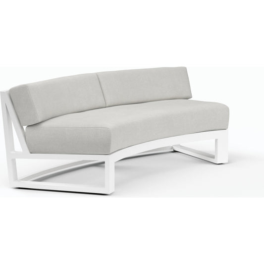 Newport Outdoor Curved Sofa by Sunset West in frost. Made from aluminum in a modern style.
