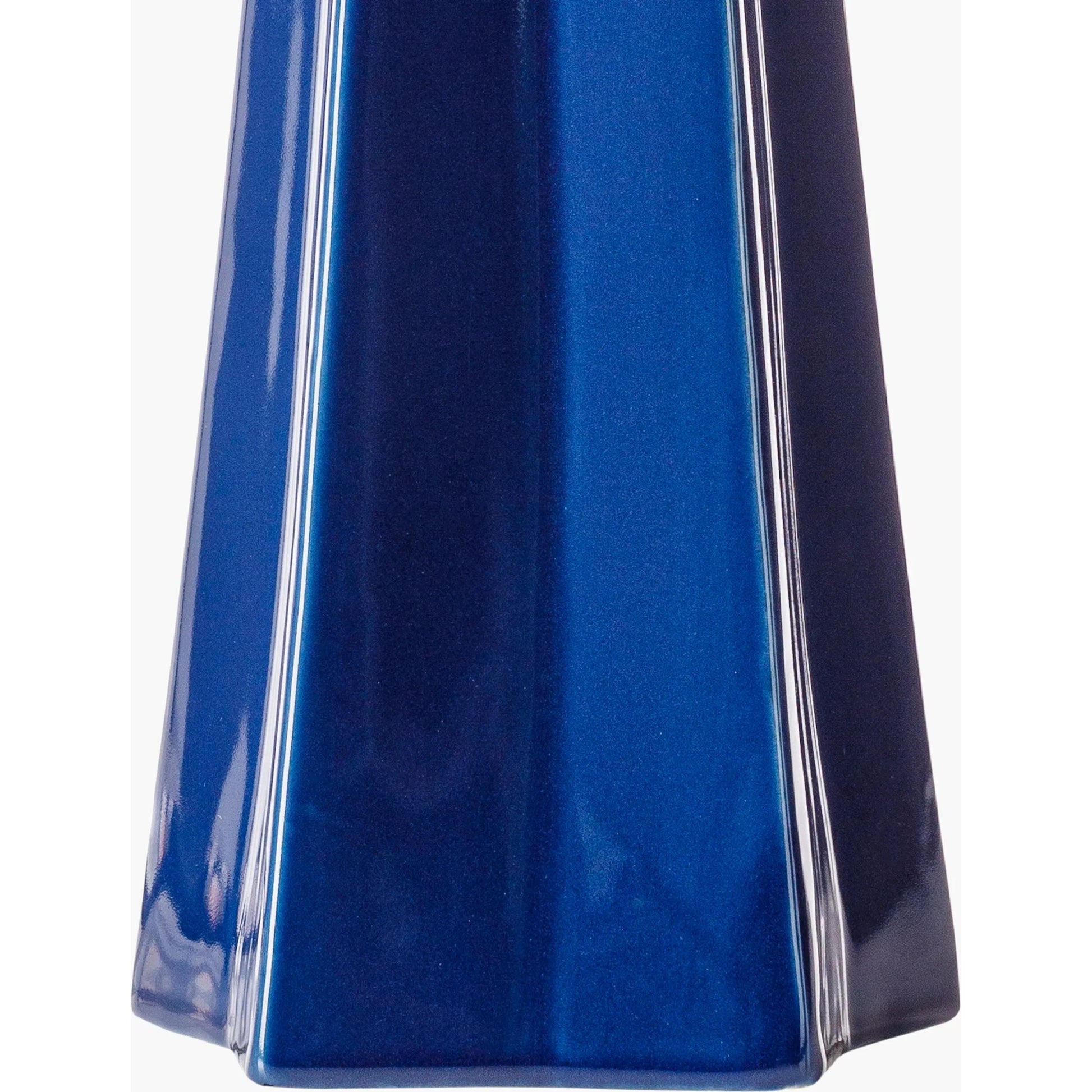 Stellan Table Lamp - 31886 by Livabliss in glazedpolished. Made from shade (outside): linen, shade (inside): polyester, body: ceramic, finial: metal, harp: metal in a modern style.
