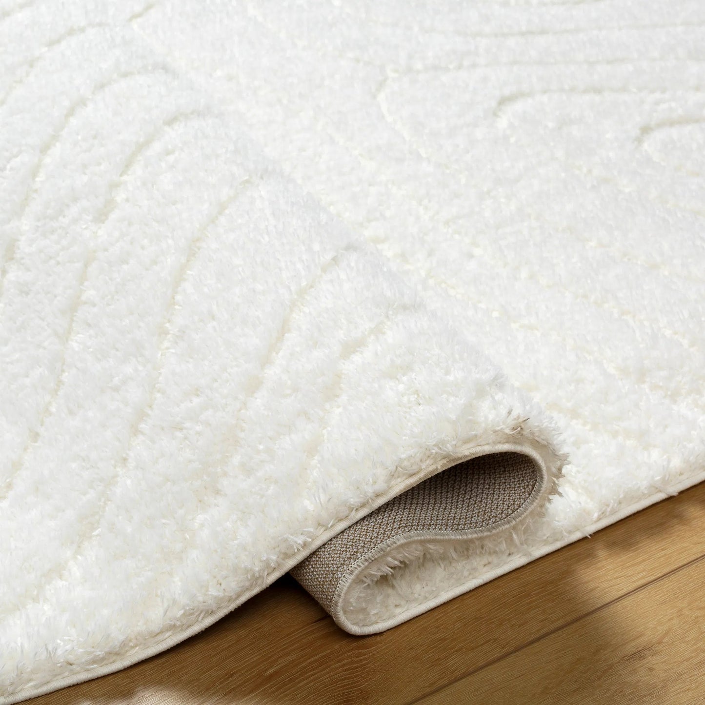 004 SI-2052501,SI-2052502,SI-2052503 | Closeup | Nomadic Rug - 490554 by Livabliss in ivory. Made from face: 100% polyester, warp: 60% jute, 40% polyester in a unique style.