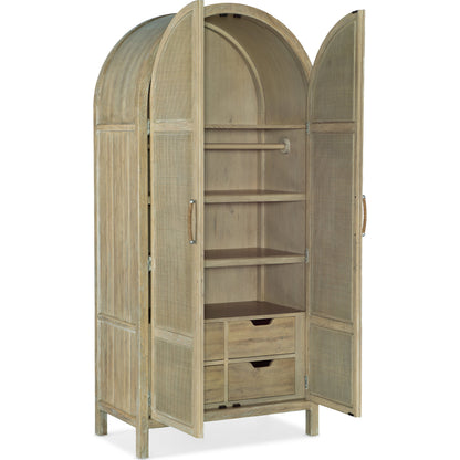 Surfrider Wardrobe by Hooker Furniture in driftwood. Made from pecan veneers, rattan, self-closing undermount drawer guides in a coastal style.