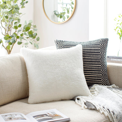 Northland Pillow - 22195 by Surya in cream. Made from front: 100% leather, back: 100% cotton in a modern style.