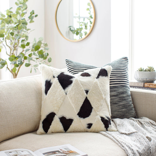 North Pillow - 33269 by Surya in cream, ivory, black. Made from 50% hair on hide, 50% sheepskin, 100% cotton in a eclectic & global style.