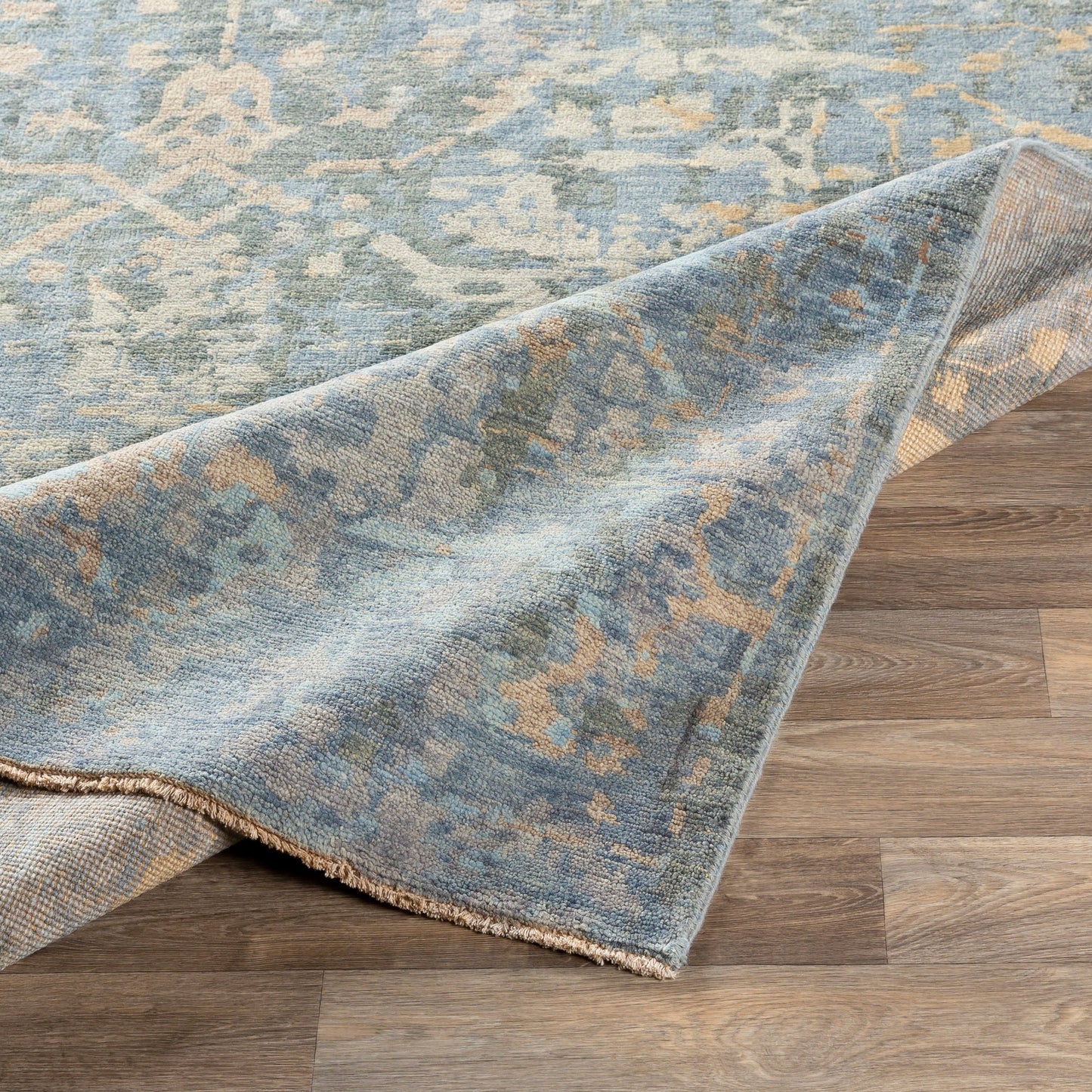 006 SI-1887604,SI-1887605,SI-1887608 | Closeup | Normandy Rug - 23602 by Surya in blue, dusty sage, wheat, light blue, tan, light beige. Made from 100% wool in a unique style.