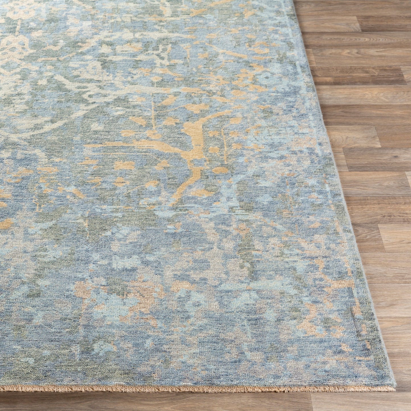 005 SI-1887604,SI-1887605,SI-1887608 | Closeup | Normandy Rug - 23602 by Surya in blue, dusty sage, wheat, light blue, tan, light beige. Made from 100% wool in a unique style.