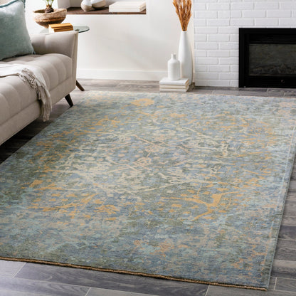 Normandy Rug - 23602 by Surya in blue, dusty sage, wheat, light blue, tan, light beige. Made from 100% wool in a unique style.