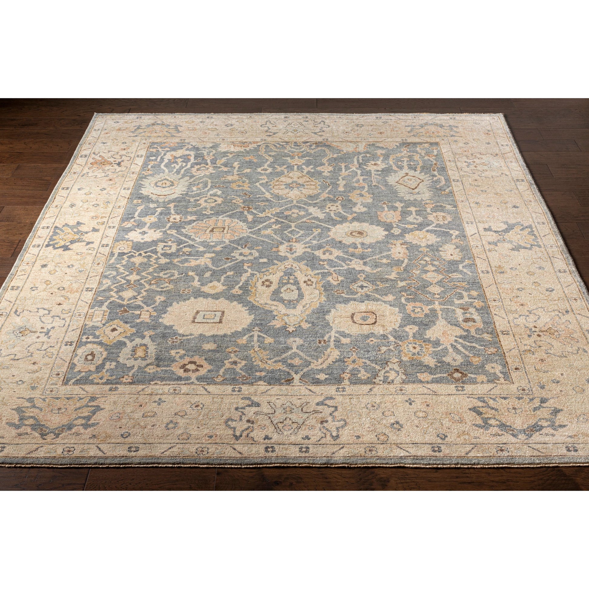 Normandy NOY-8007 Rug by Surya in charcoal, medium gray, beige, light blue, dark brown, dusty coral. Made from 100% wool in a unique style.
