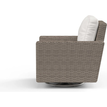 Coronado Outdoor Swivel Rocker in Canvas Flax by Sunset West in driftwood. Made from resin wicker in a modern style.