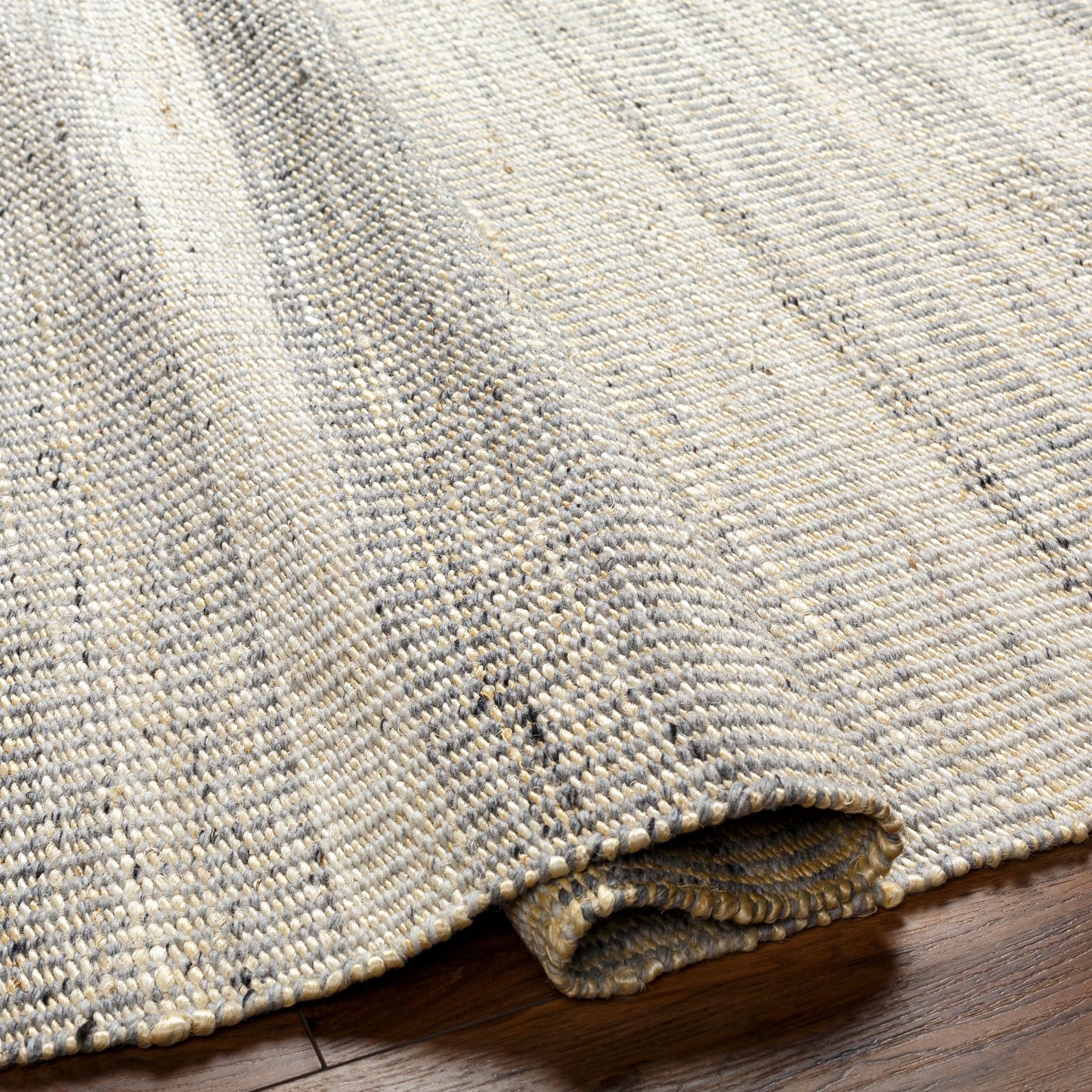 006 SI-1887652,SI-1887653,SI-1887654,SI-1887655,SI-1887656,SI-1887657 | Closeup | Nottingham NTM-2300 Rug by Livabliss in charcoal, light gray, light beige, cream. Made from 50% jute, 50% wool in a unique style.