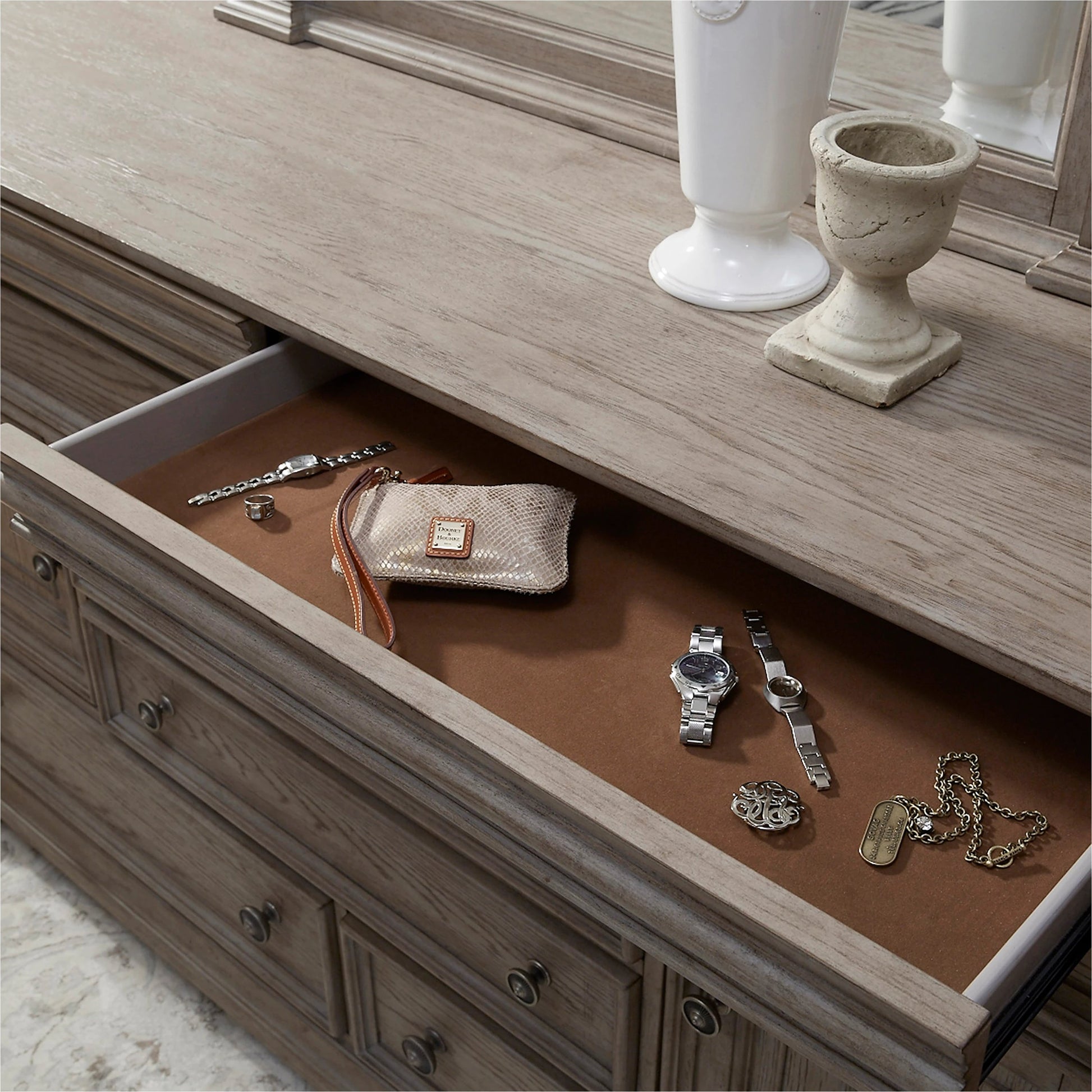 Kingsbury Dresser by Pulaski Furniture in french grey. Made from oak veneers, hardwood solids in a traditional style.