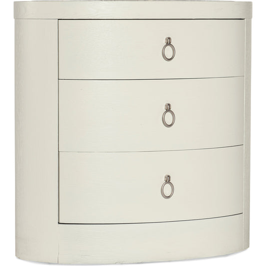 Serenity Wavecrest Oval Nightstand by Hooker Furniture in shell, champagne. Made from oak veneers, honed marble veneers with slight sandblasting in a modern style.