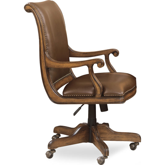 Brookhaven Desk Chair by Hooker Furniture in brown and cherry. Made from cherry veneers with split grain leather in a transitional style.