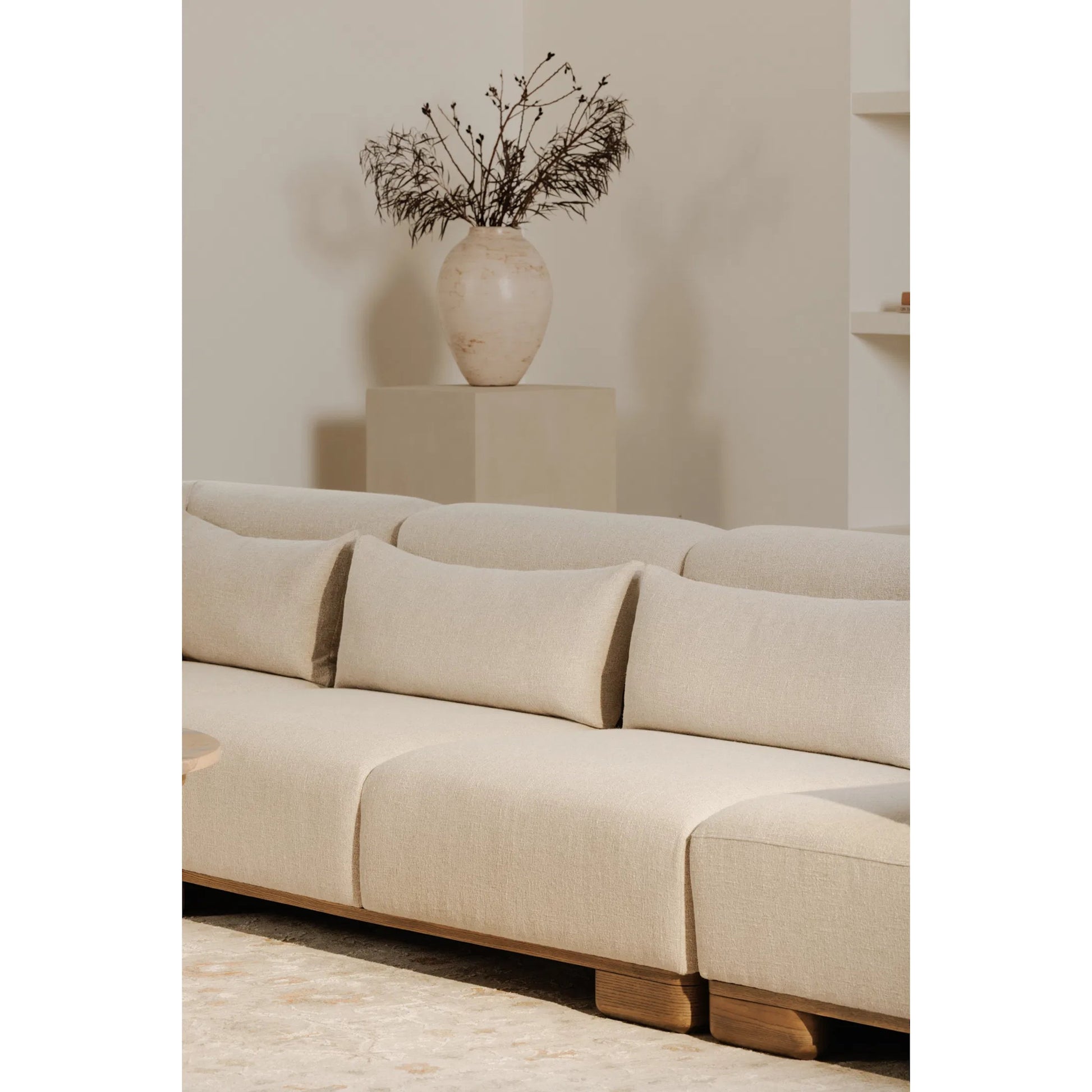 June Slipper Chair by Moe's Home Collection in oatmeal. Made from upholstery: 72% polyester, 28% acrylic, oak veneer base, foam, feather, fiber fill, solid wood, plywood frame in a unique style.