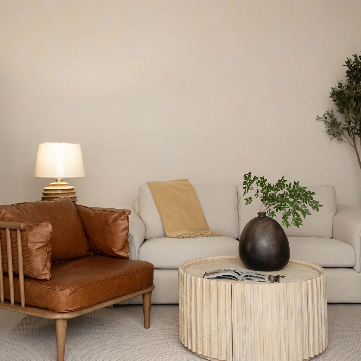 001 SI-2325152 | Lifestyle | Oasis Coffee Table by LH Imports in beige and natural white washed. Made from solid acacia wood, mdf acacia veneer in a transitional style.