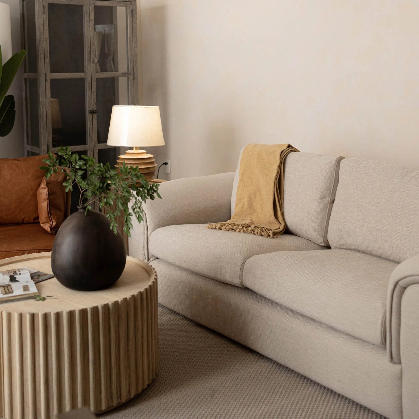 002 SI-2325152 | Lifestyle | Oasis Coffee Table by LH Imports in beige and natural white washed. Made from solid acacia wood, mdf acacia veneer in a transitional style.