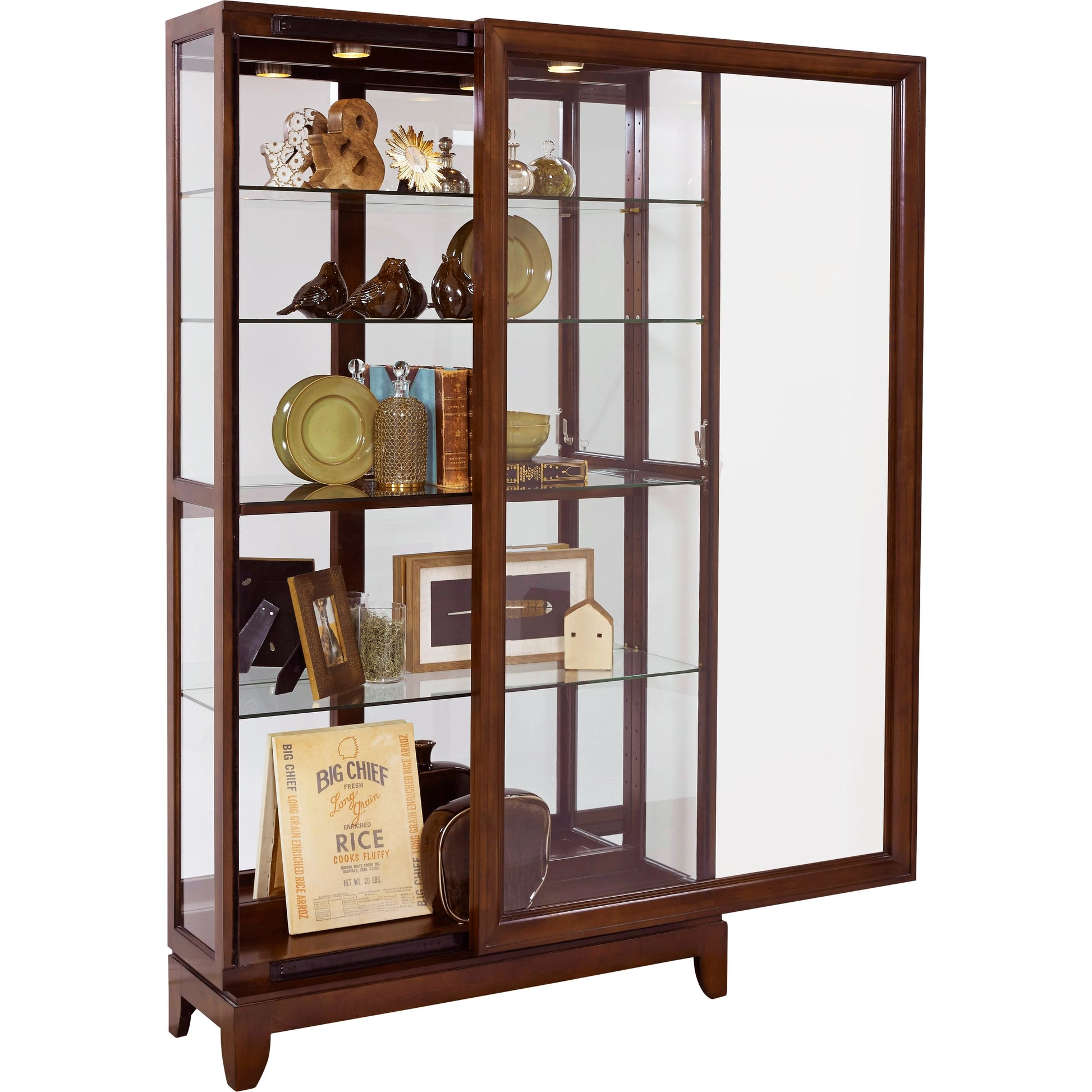 Two Way Door Curio Chocolate Cherry by Pulaski Furniture in chocolate cherry. Made from poplar wood cherry wood veneers in a traditional style.
