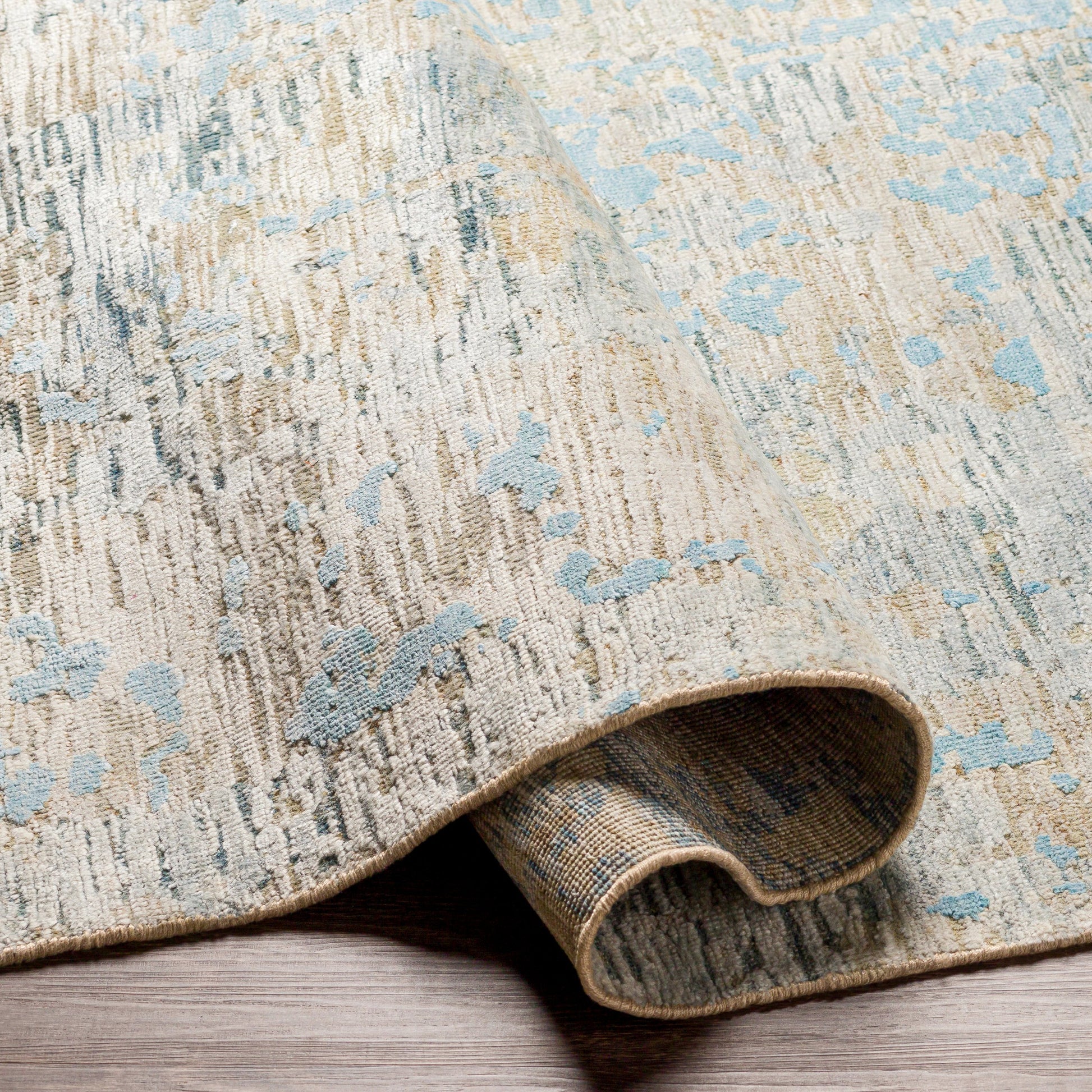 Ocean Rug - 26049 by Surya in blue, ice blue, taupe, light gray. Made from 60% new zealand wool, 40% viscose in a unique style.