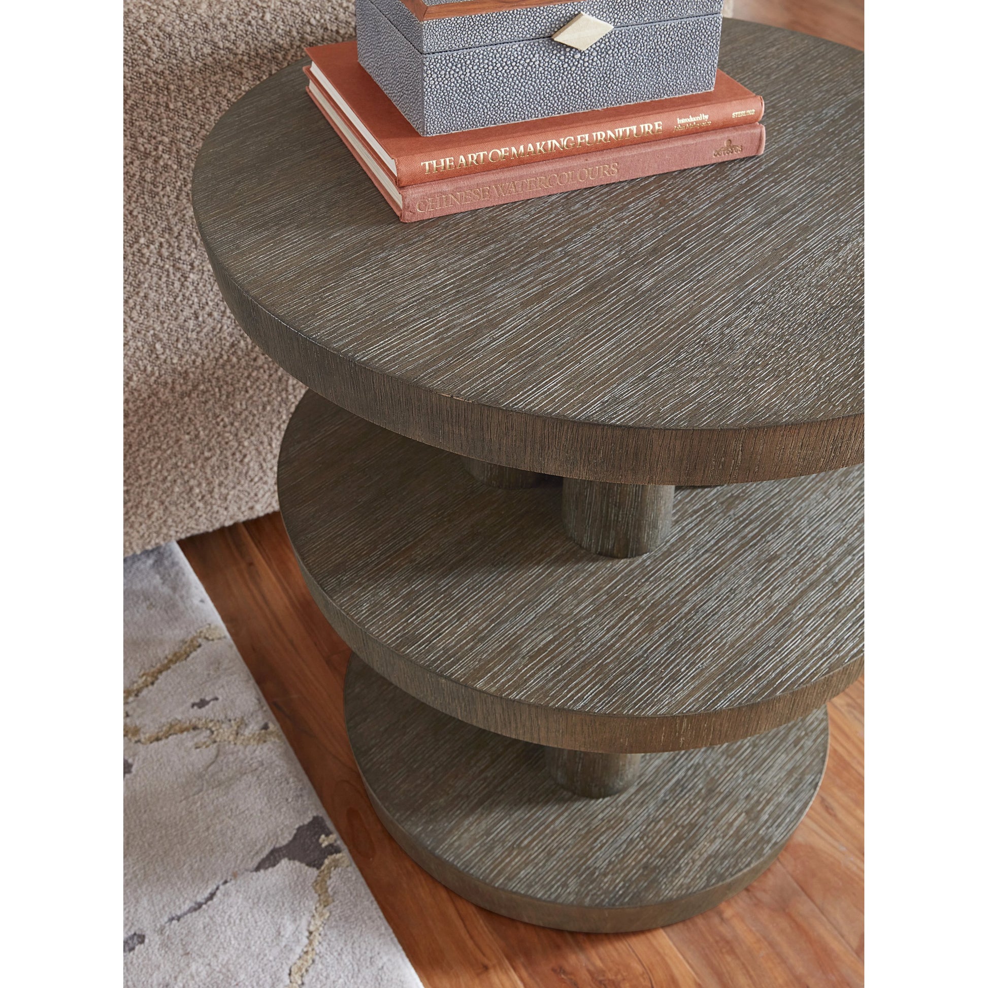 Modern Mood Round Side Table by Hooker Furniture. Made from oak veneers in a modern style.