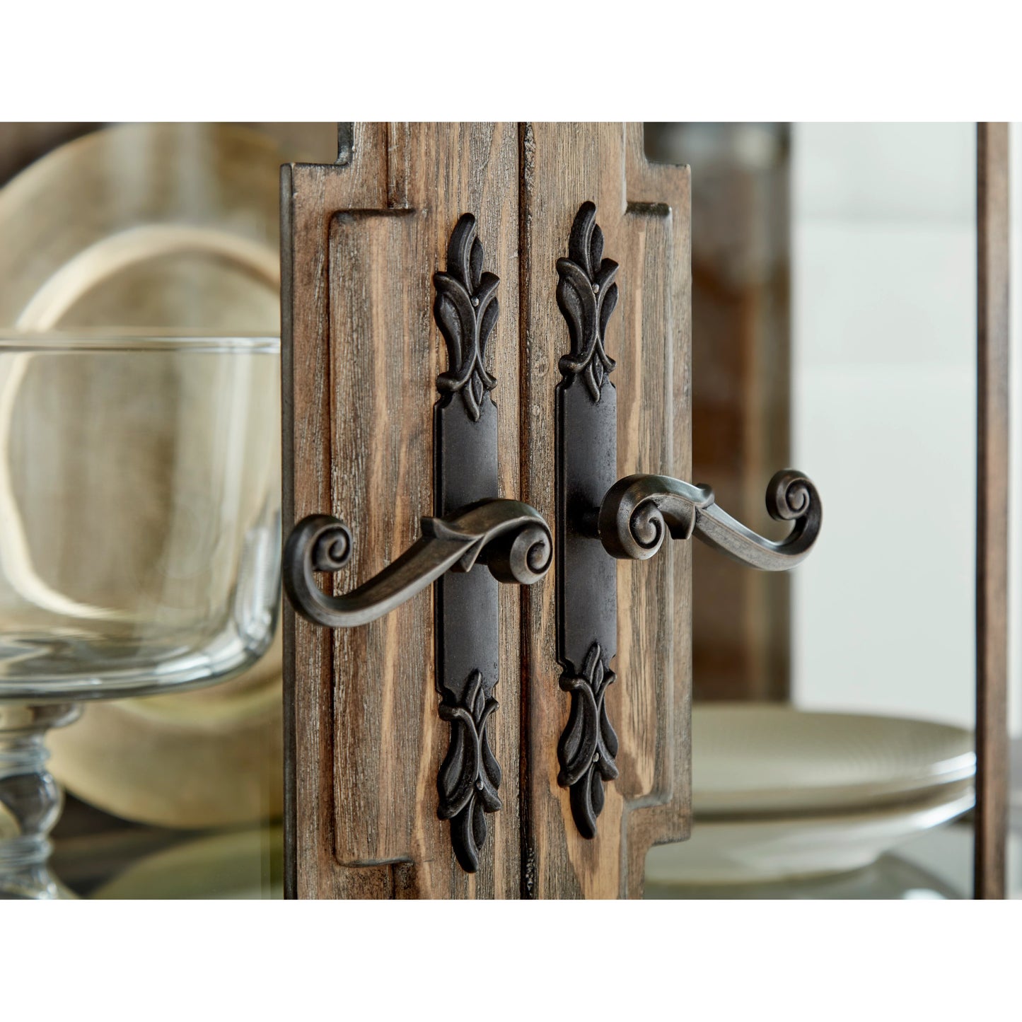 005 SI-2064896 | Closeup | Architrave China Cabinet by A.R.T. Furniture in almond. Made from pine solids and veneer, glass, metal in a traditional style.