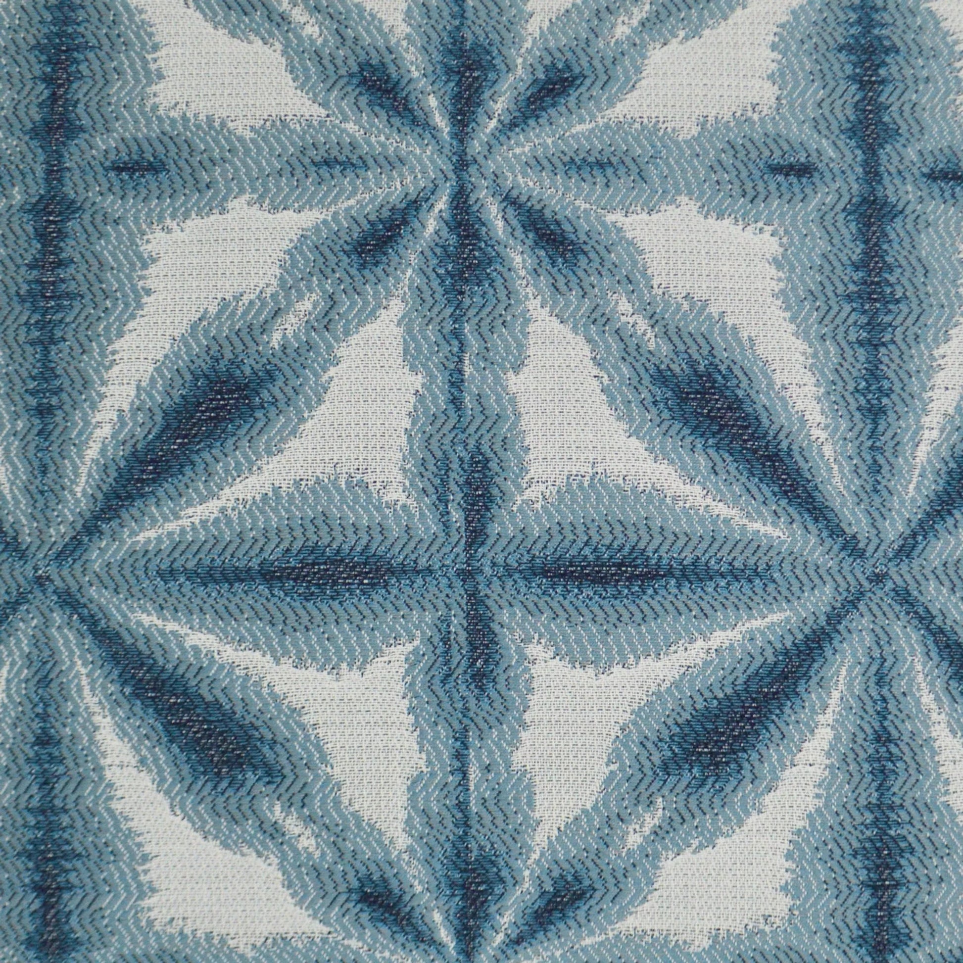 Sunshibo Flower Indoor/Outdoor Pillow by DV Kap Home in blue. Made from 85% solution dyed polyester, 15% solution dyed acrylic in a transitional style.