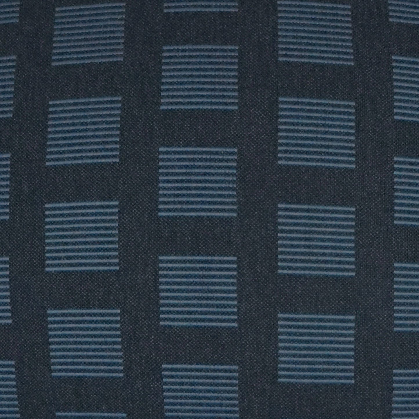 002 SI-2028281 | Closeup | Novara Pillow by DV Kap Home in indigo. Made from 100% solution dyed sunbrella acrylic in a modern style.