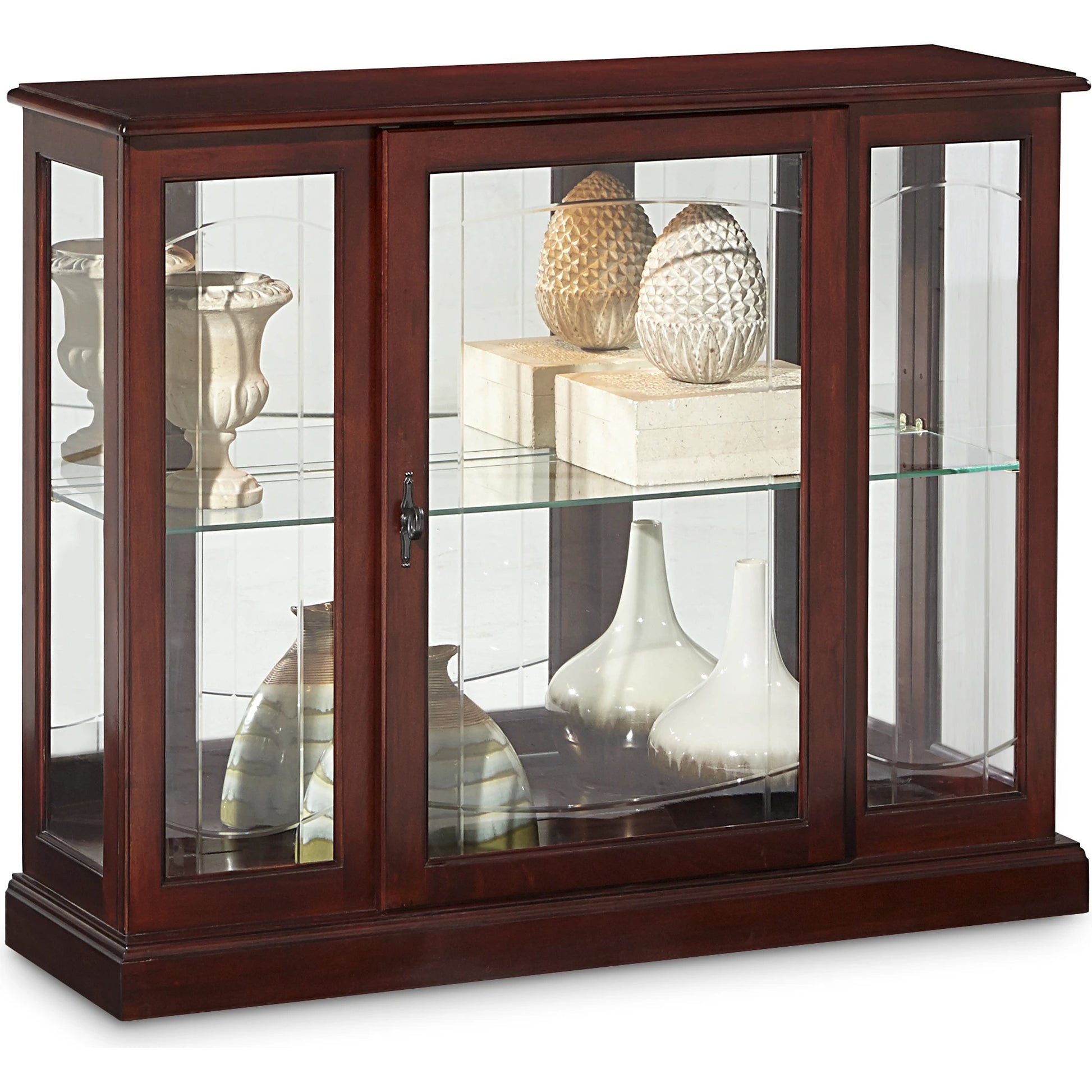Curio Console by Pulaski Furniture in cherry brown. Made from select hardwoods in a traditional style.