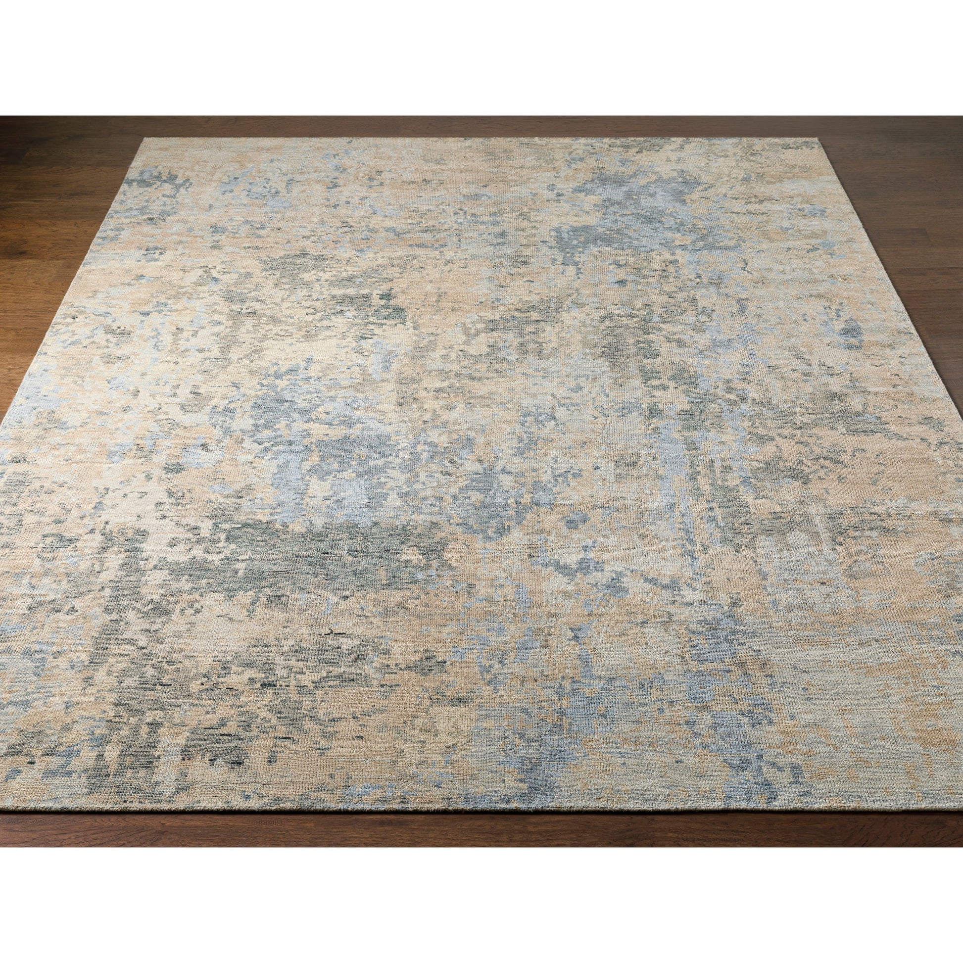 Odyssey ODY-2301 Rug by Surya in tan, beige, denim, dark blue, sage, charcoal. Made from 100% wool in a unique style.