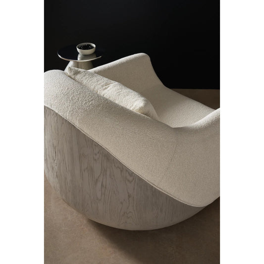 Serenity Swivel Chair by Caracole in ivory and fossil. Made from resin in a unique style.