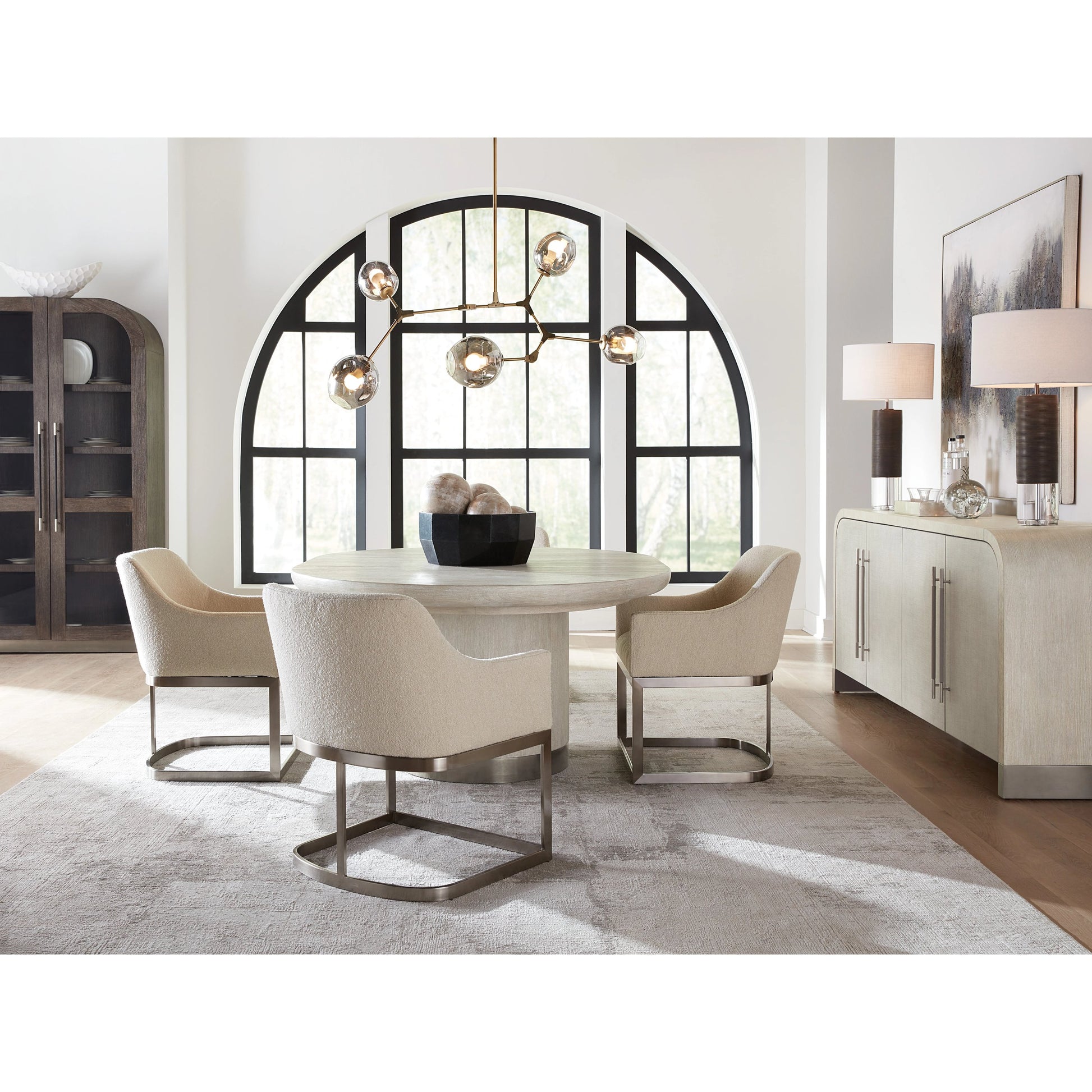 Modern Mood Round Dining Table by Hooker Furniture. Made from oak veneers, metal in a modern style.