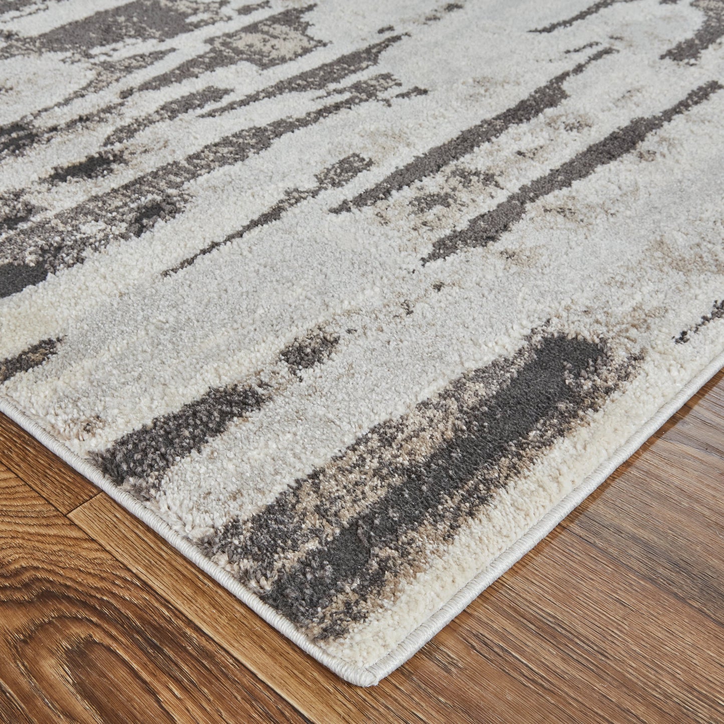 011 SI-1942557,SI-1942559,SI-1942560,SI-1942561,SI-1942563,SI-1942565 | Closeup | Vancouver Transitional Rug - 39FIF by Feizy in ivory, brown, gray. Made from 74% polypropylene frieze, 26% high bulk polyester in a unique style.