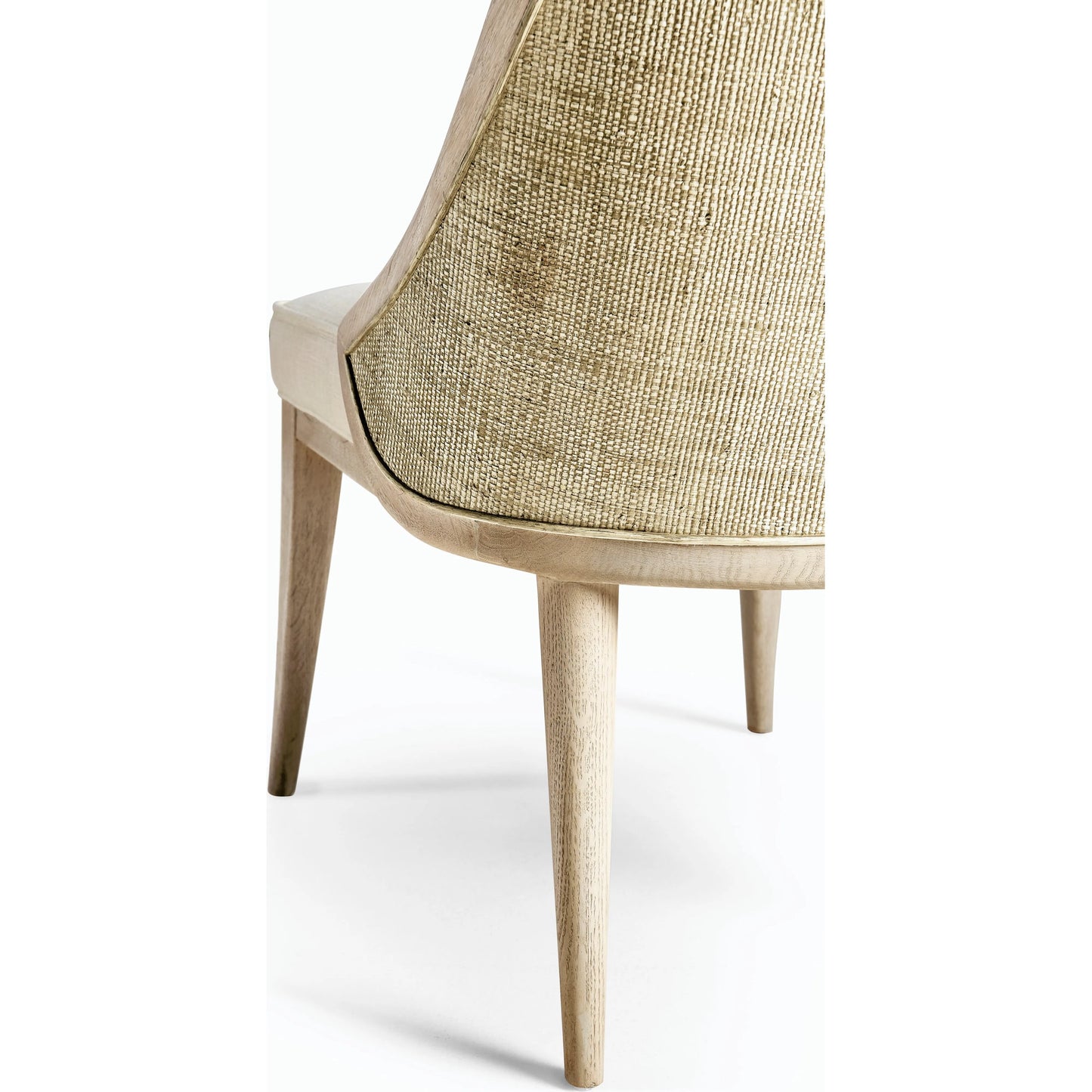 004 SI-2186259 | Closeup | Water Basin Dining Side Chair by Jonathan Charles in whitewash oak. Made from oak, foam, fabric, grass cloth in a modern style.