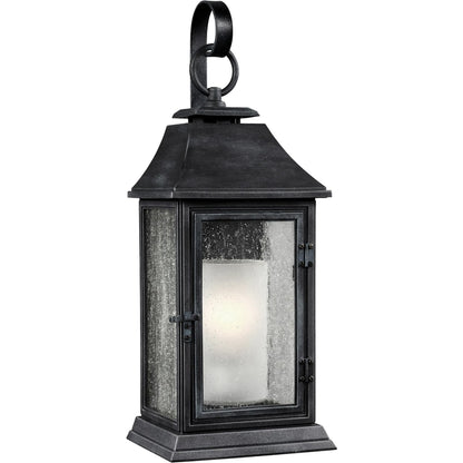 Shepherd  Sconce by Generation Lighting in dark weathered zinc. Made from stonestrong in a traditional style.
