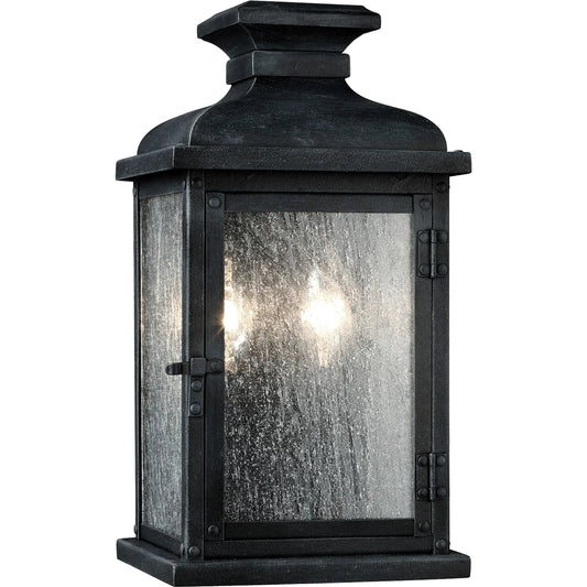 Pediment Outdoor Sconce by Generation Lighting in dark weathered zinc. Made from stainless steel in a traditional style.