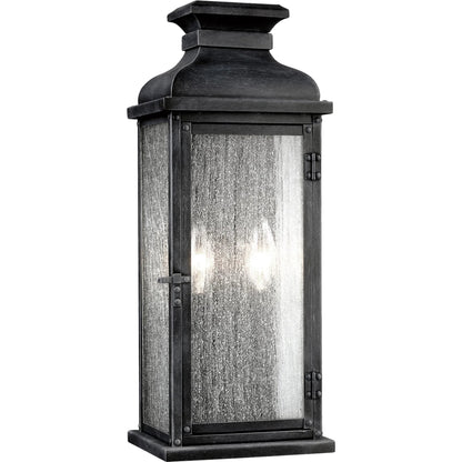 Pediment Outdoor Sconce by Generation Lighting in dark weathered zinc. Made from stainless steel in a traditional style.