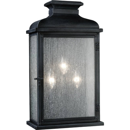 Pediment Outdoor Sconce by Generation Lighting in dark weathered zinc. Made from stainless steel in a traditional style.
