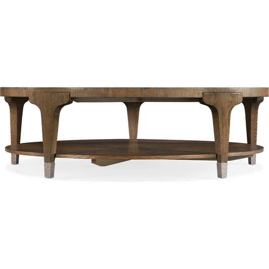 Chapman Round Cocktail Table by Hooker Furniture in sorrel. Made from white oak veneers, metal ferrules in a transitional style.