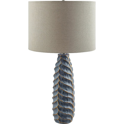 Ossining Table Lamp by Surya in wheat, translucent, metallic nickel, gray, metallic silver, white and painted. Made from body: resin, shade (outside): linen, shade (inside): linen, finial: metal in a modern style.