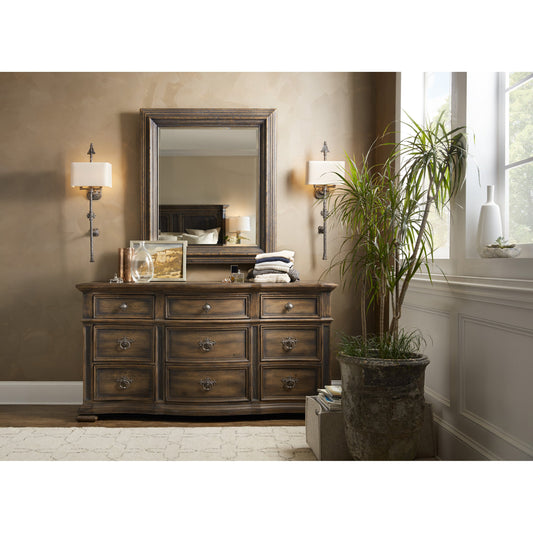 Williamson Dresser by Hooker Furniture in saddle brown. Made from white oak, walnut veneers with cedar, resin in a traditional style.