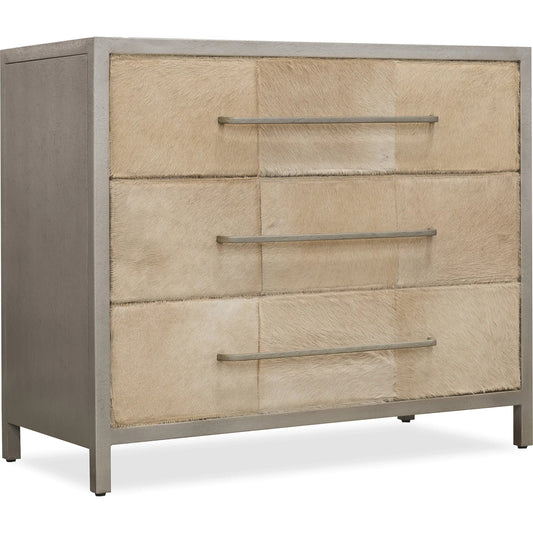 Melange Holy Cow Chest by Hooker Furniture in silver metal, beige hair on hide leather. Made from wood, metal, hair on hide leather in a transitional style.