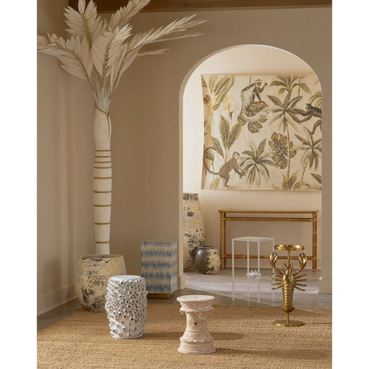 Silang Console Table by Currey and Company in natural rattan, clear. Made from rattan, wrought iron, glass in a coastal style.