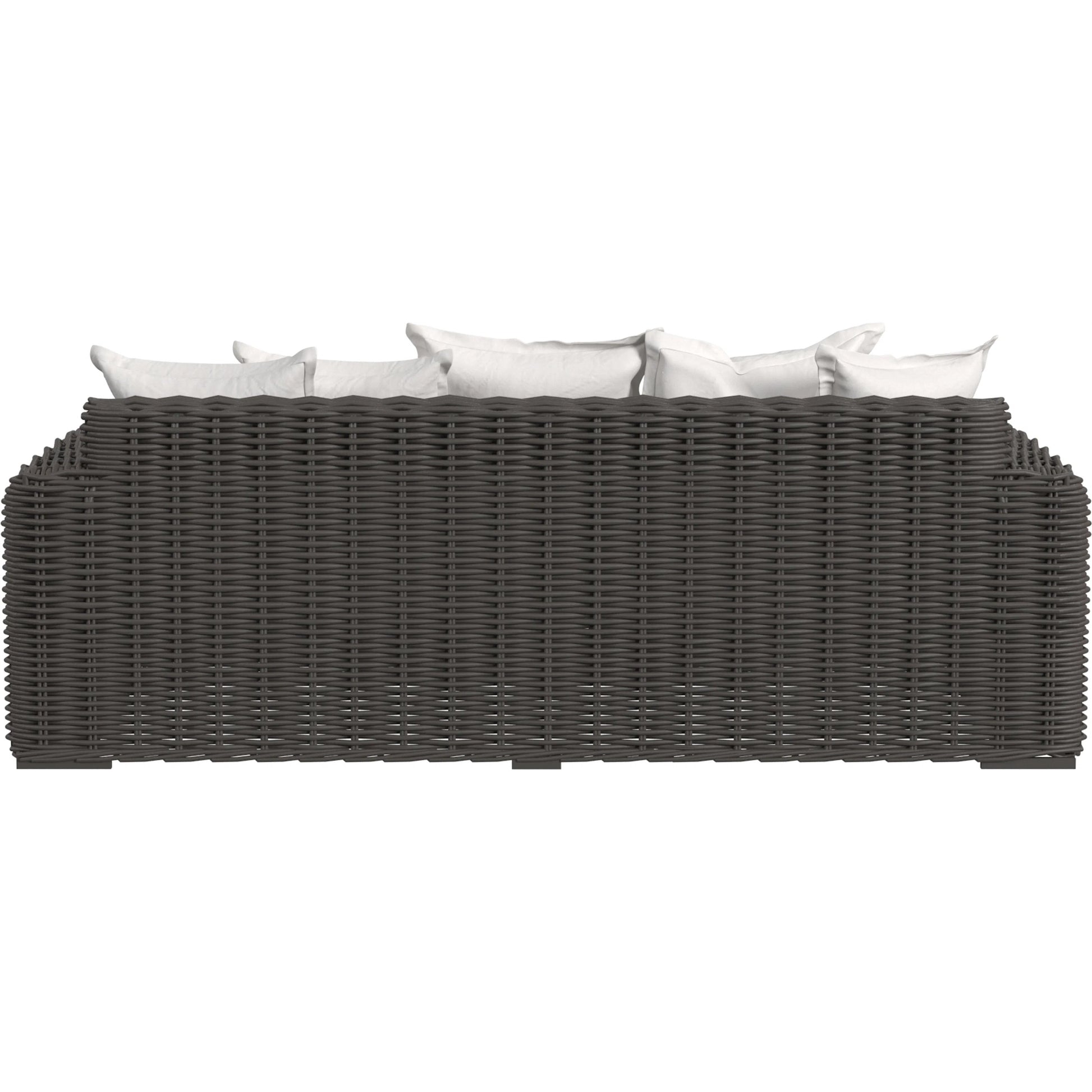 Cabo Outdoor Loveseat by Sunset West in dark wood. Made from resin wicker in a rustic style.