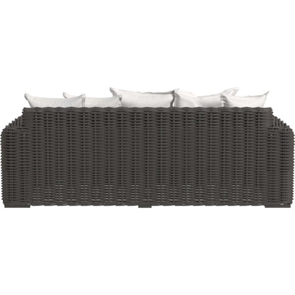 Cabo Outdoor Loveseat by Sunset West in dark wood. Made from resin wicker in a rustic style.